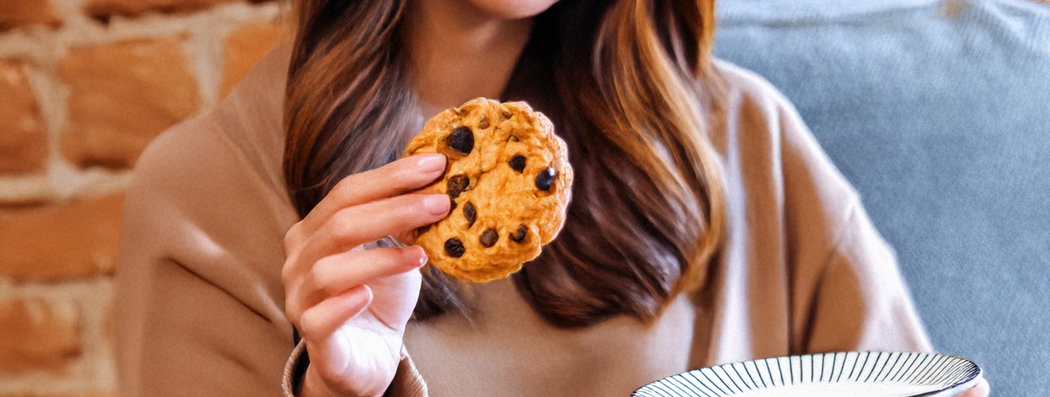 Lady holding a cookie